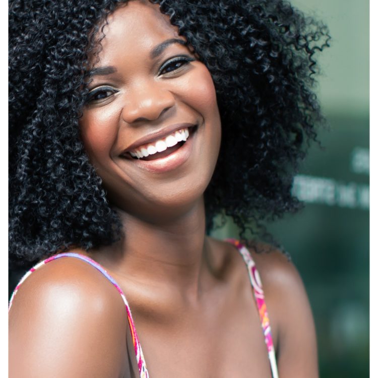 Smiling woman who uses invisalign