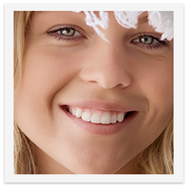 Framed photo of a woman smiling with dotted line around the edges